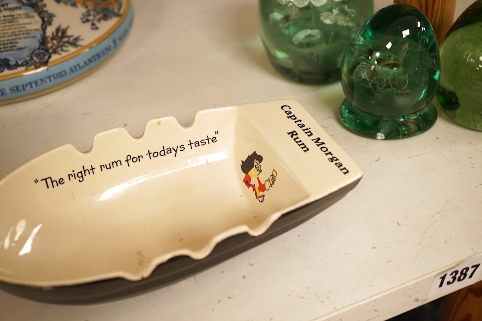 Wade 'Purser's Navy Rum Decanter' and two Captain Morgan rum boat ashtrays, decanter 24cm high